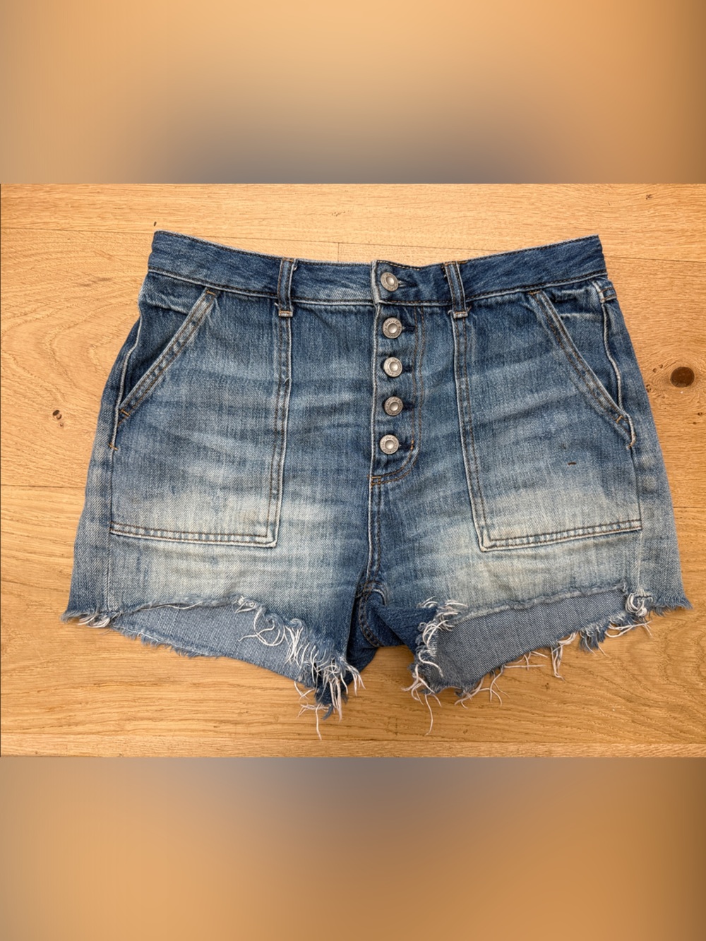 Free people we the free button fly Jean shorts